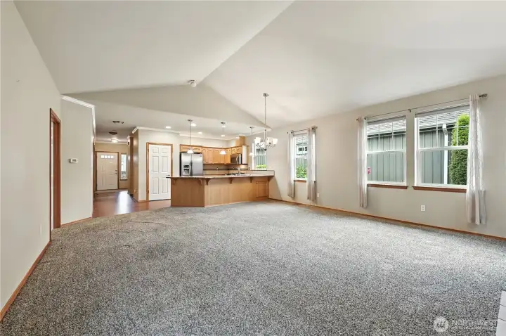 Large open living area with vaulted ceilings