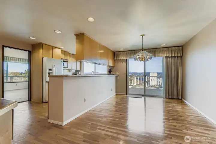 Dining area that opens up to view entertainment deck.