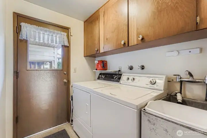 Main floor laundry.  Washer & dry go with seller.