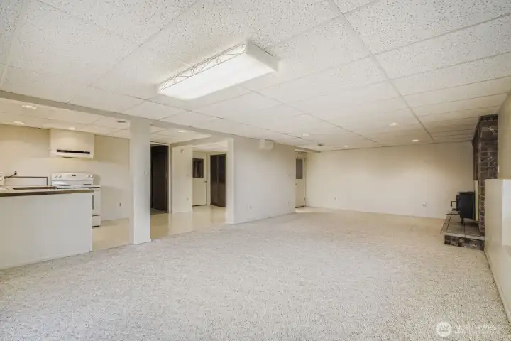 Another view of the lower level family room plus dinging area off 2nd kitchen.