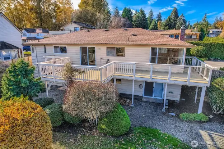 View of the back of the home and the Huge entertainment deck.
