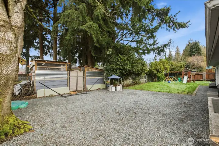 Gravel area great for extended patio space, fire pit, so many possibilities ~