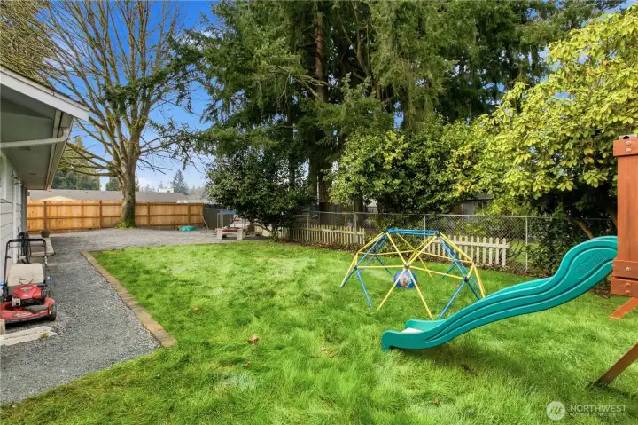 Wonderful backyard! The big toy with slide can stay.