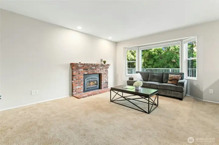 The family room has a second fireplace.