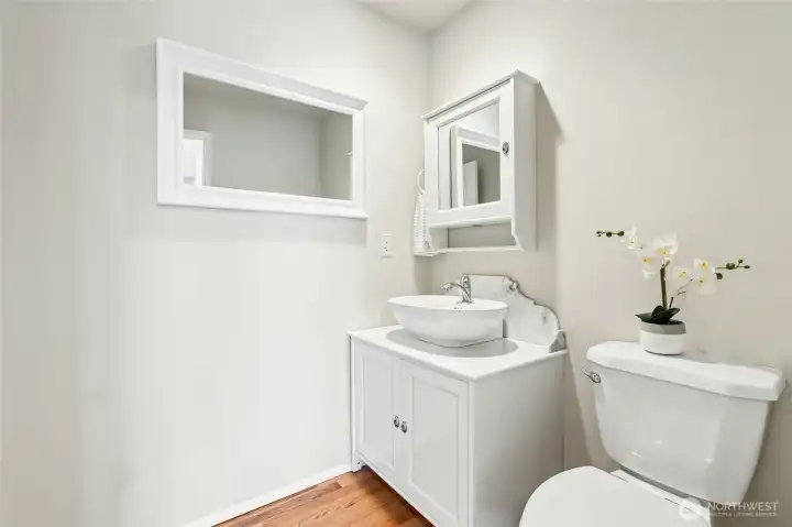 Updated half bath on the main level.