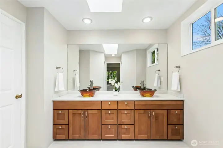 Primary bath also has new cabinets.