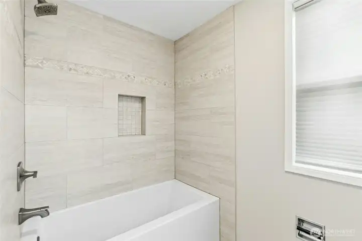 Primary bath tub and shower.
