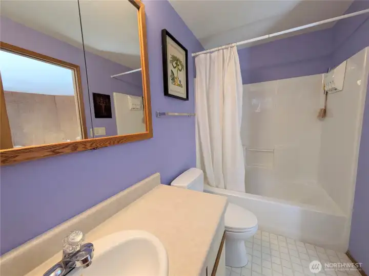 The primary bathroom has a tub/shower combo.
