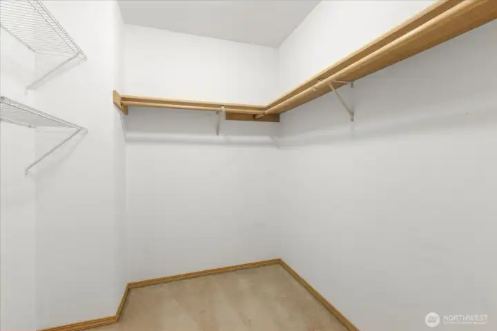 Primary walk-in closet.