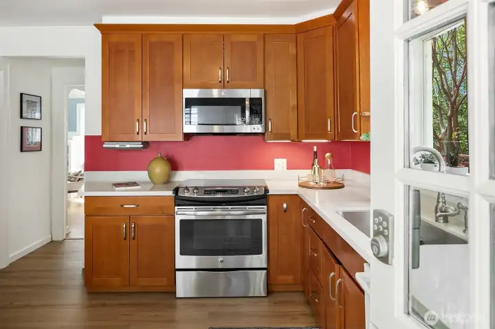 The updated kitchen is light and bright with north and west facing windows.