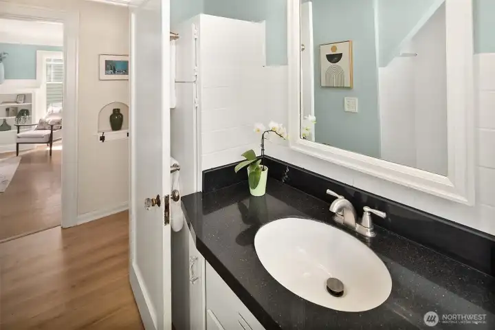 There is extra storage space behind the door.