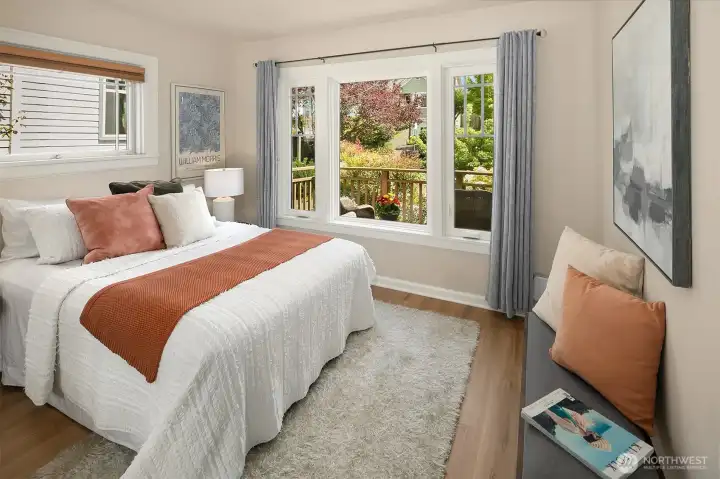 The main level bedroom has north and east facing windows.