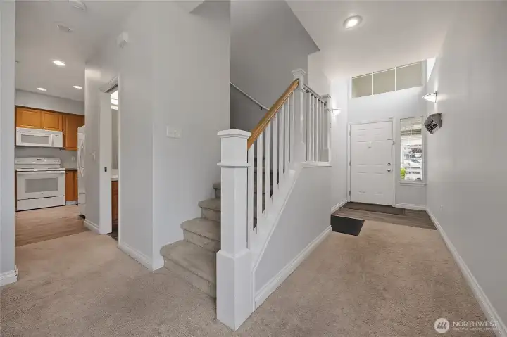 Grand entrance with high ceilings making it feel open and welcoming. Grand entrance with high ceilings making it feel open and welcoming.