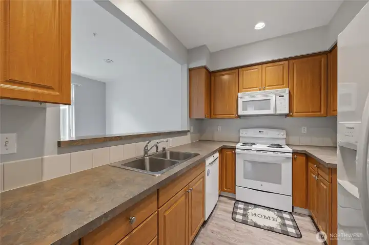 The kitchen delivers plenty of storage and counter space, keeping everything within reach and right where you need it. The kitchen delivers plenty of storage and counter space, keeping everything within reach and right where you need it.