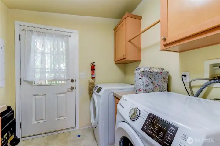 Laundry/utility room with cabinets. Washer & dryer included! Laundry/utility room with cabinets. Washer & dryer included!