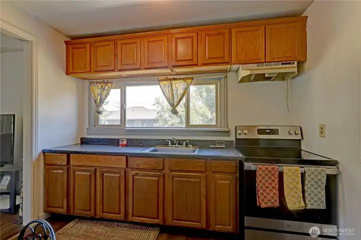 Kitchen with oak cabinets