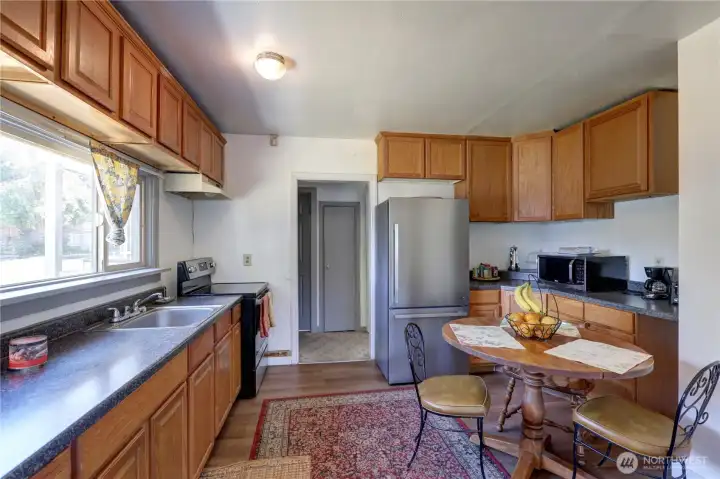 Kitchen with eating space and Corian countertops