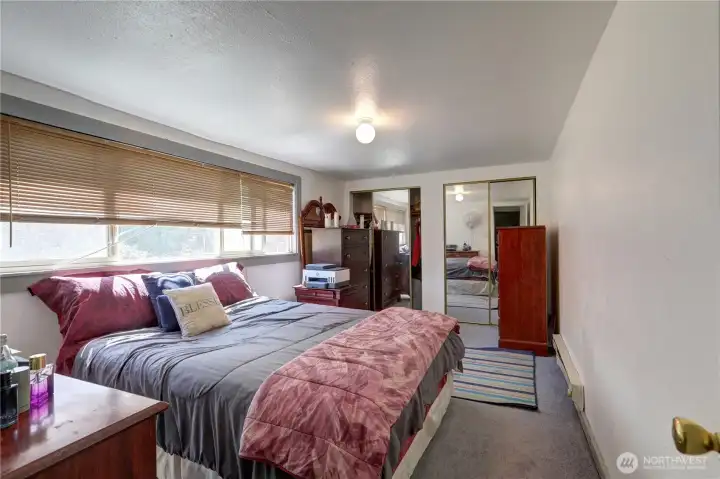 Primary bedroom large enough for king bed and large closet space.