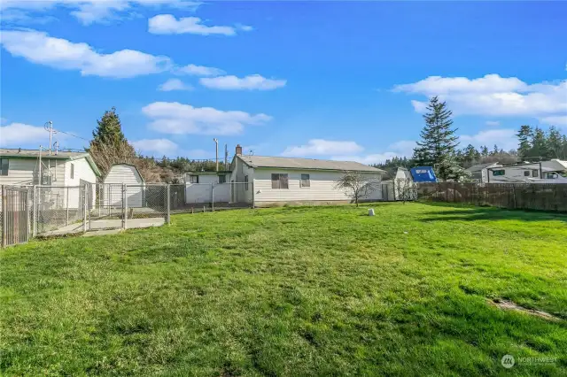 There is a second kennel by the double car garage. The property is sold as is with huge potential for your choices in lifestyles. Enjoy the beach now and prepare the property for a wonderful retirement home or two!