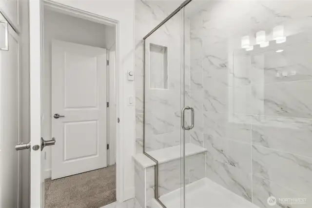 Primary bathroom suite. Features and colors may vary.