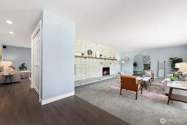 Entry with formal living room to the right and family room ahead.