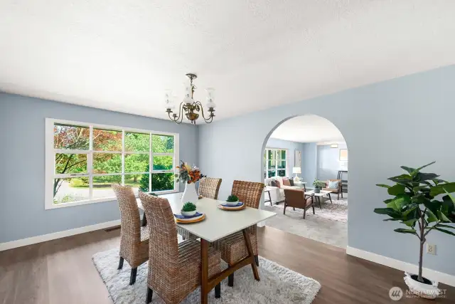 Formal dining room adjacent to the formal living room creating an easy flow for entertaining