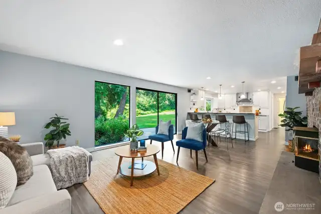 Family room opens to the kitchen with sliding glass door to the private back yard.