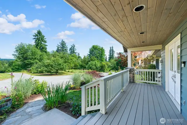 Beautiful front porch with French doors to the bonus room.