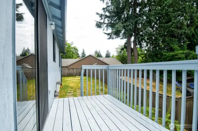 Deck overlooking the side yard.