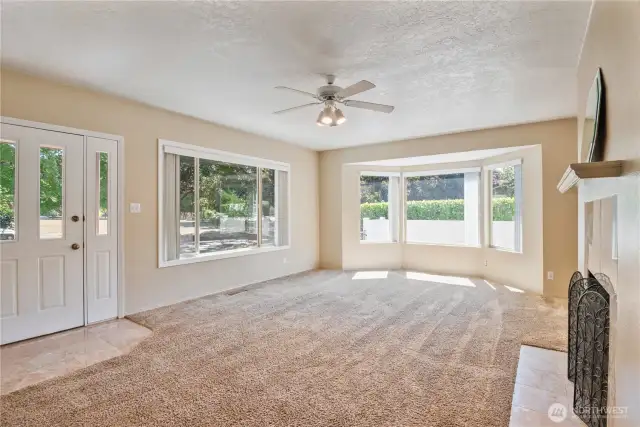 Spacious living room with tons of natural light overlooking Vandercook Park