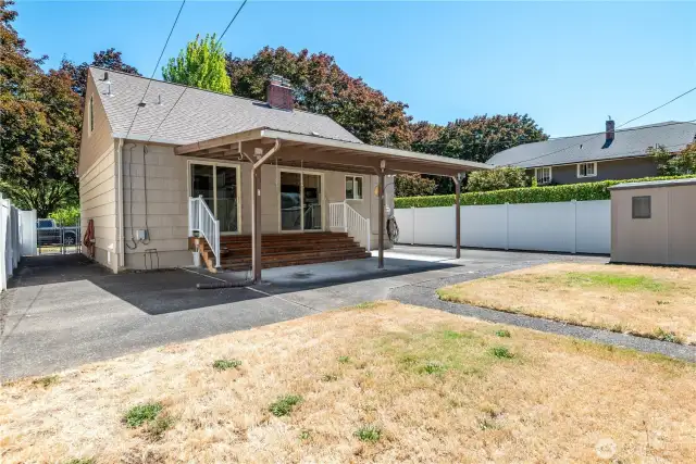 Wonderful clean slate backyard with large covered patio space
