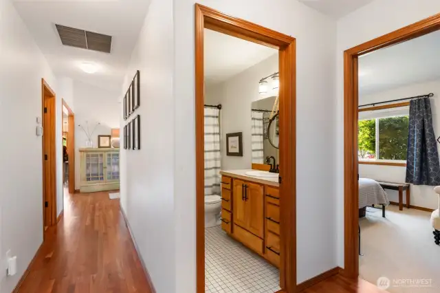 Hallway to the 2nd full bath and guest bedroom