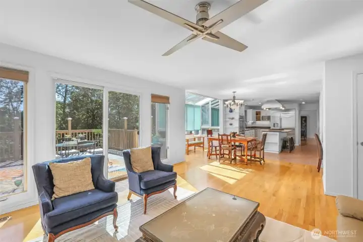 Looking back toward the kitchen and dining space, the open-concept layout comes to life. The family room, breakfast area, and kitchen work together as the true hub of the home, perfect for gatherings both large and small.