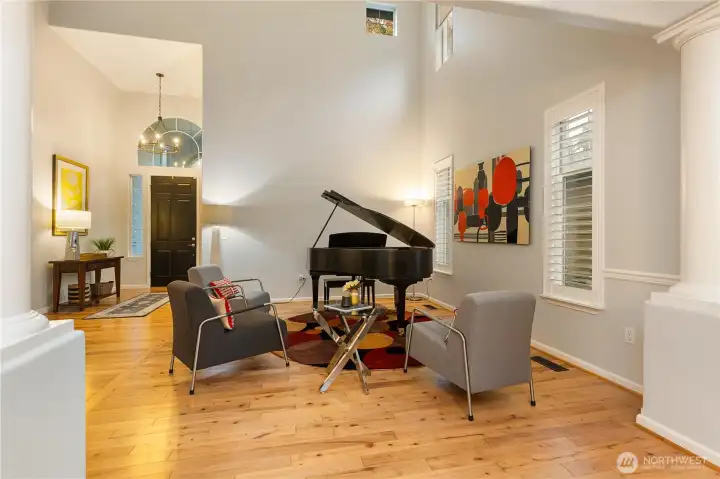 Another view from the living room towards the foyer. You will love the plantation shutters too!
