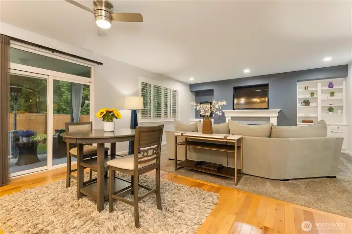 This image offers a lovely peek towards the outdoor covered patio and trees beyond...