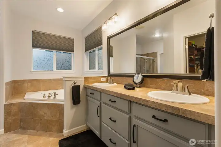 Stylish Primary en suite 5-piece bath and walk-in closet...