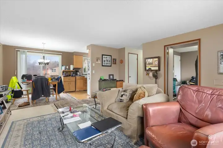 Living Room Opens to Dining Room & Kitchen. Slider to the Backyard.