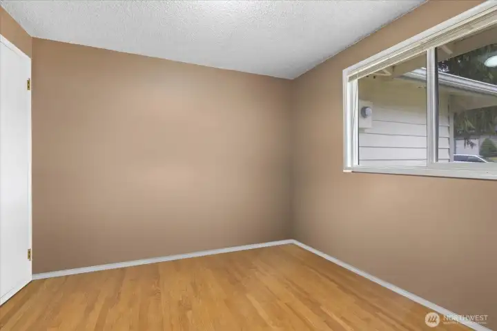 4th Bedroom. Has a door from living room and one from the hallway. Would be a perfect home office or just use as the 4th Bedroom.