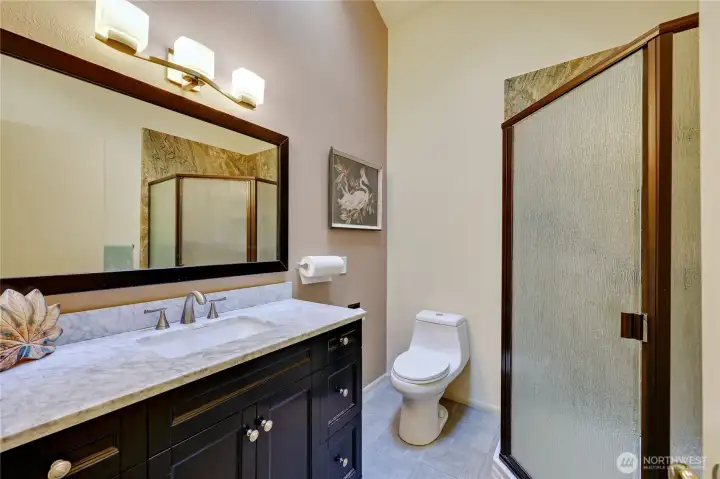 Hall bathroom with a shower.