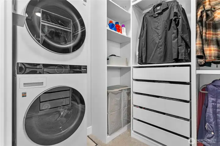 Main floor laundry off primary bedroom ensuite