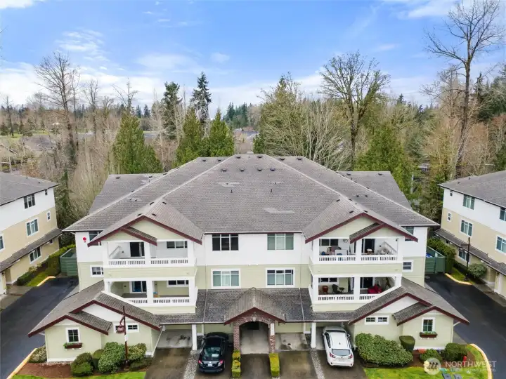Top floor in back left side. Garage bottom  front left with windows