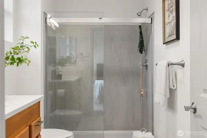 Brand new shower, countertop, flloor & light fixture