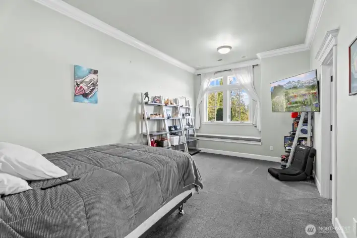 Bedroom 4 with adjoining bath and walk in closet.