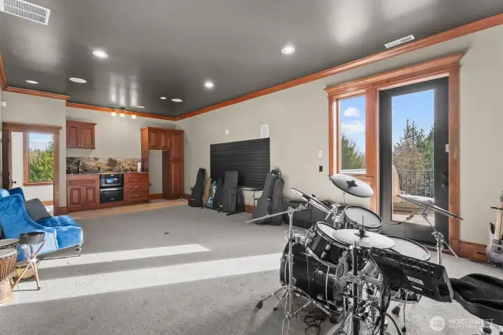 Theatre room with second kitchen.