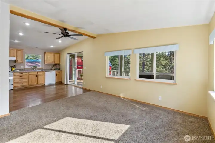 Open concept, vaulted living room, open to the kitchen