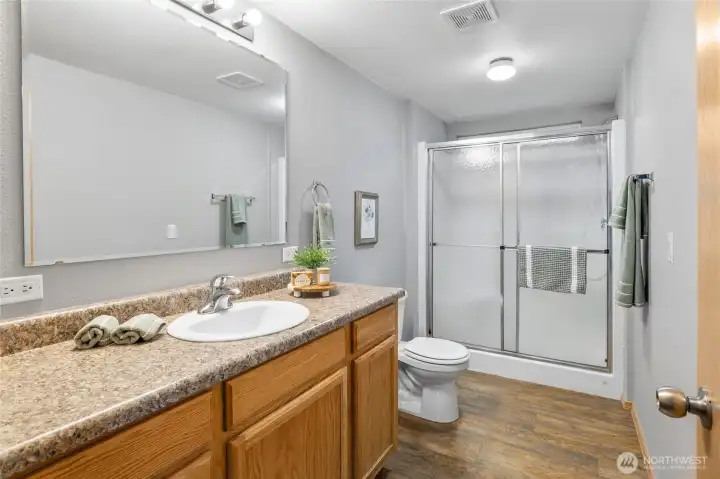 A beautiful and spacious primary spa bath