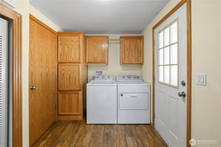 Wonderful laundry/mud room with access to the hall bath, side exterior door, or the kitchen - room for a stand up freezer!