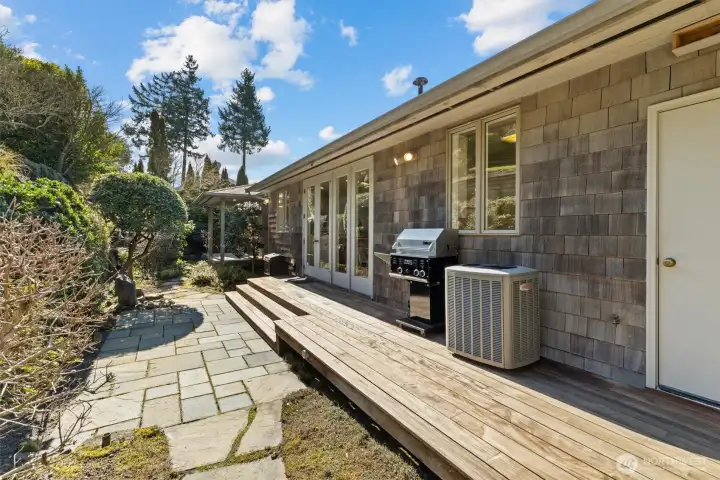 French doors from main living area open to backyard