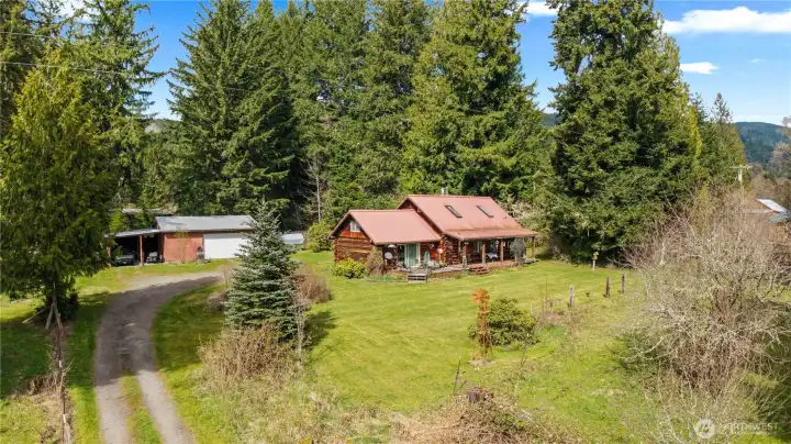 Log Home w/895sqft Detached 2-Car Garage/Shop w/2-Car Carport attached.