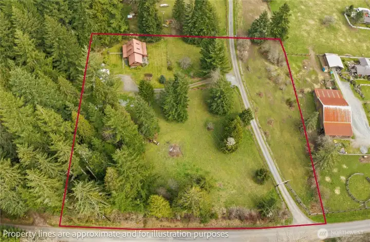Nestled on 3.28 acres of level, usable land with Fencing in place. Land is on either side of the shared driveway. Pasture space to both sides of the driveway is perfect for Horses!